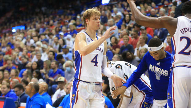 Kansas freshman guard Gradey Dick (4) returns to the bench during the second half of Thursday's game against Pitt State inside Allen Fieldhouse.